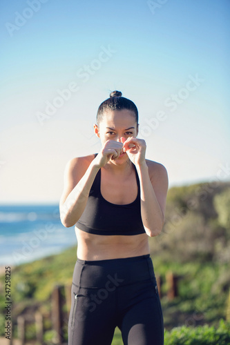 Woman dancing on the beach