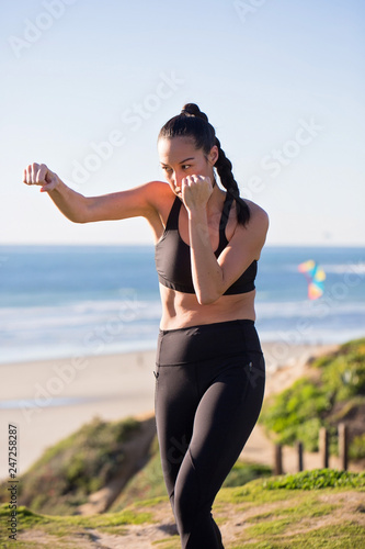 Woman dancing on the beach