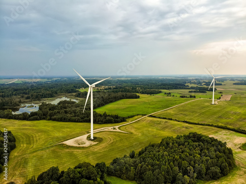 Aerial view of wind turbines generating power, located in Lithuania.