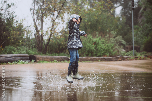 Fototapeta Naklejka Na Ścianę i Meble -  Playing in the Rain