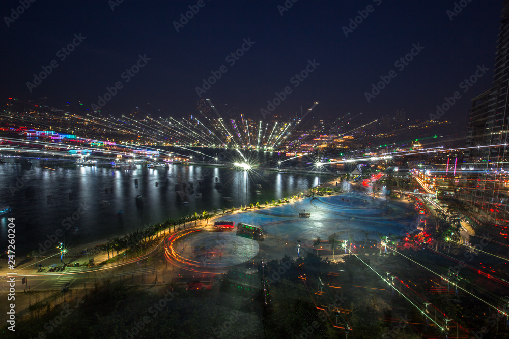 Abstract background Of the night lights, with lights from (cars, passenger boats, street lights), a beautiful art wallpaper Abstract background Of the night lights, with lights from (cars, passenger boats, street lights), a beautiful art wallpaper
