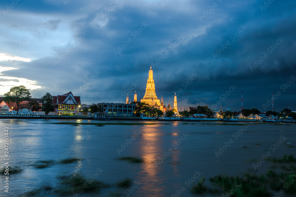 Wat Arun Ratchawararam-Bangkok: September 1, 2018, the waterfront atmosphere during a stormy rain is coming in the Phra Nakhon area near Khun Mae Pueak Cross River Ferry Pier, Thailand 