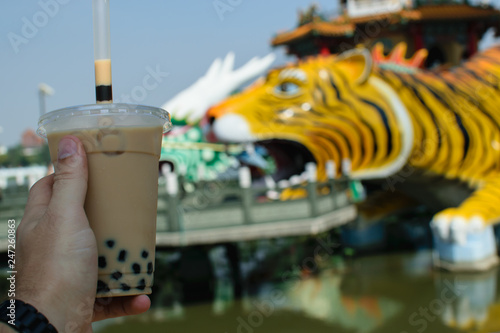 Booba Tea with popular Taiwanese tourist destination in background   photo