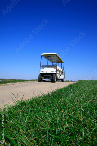 golf course landscape and battery cart