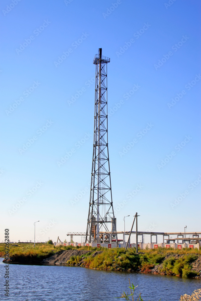 Oil pipe tower under blue sky