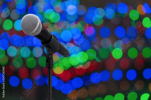 microphone on stand with defocus or bokeh lights backgound