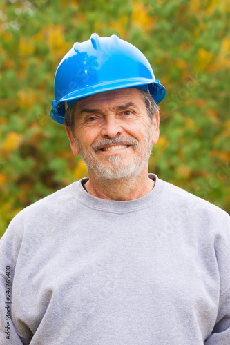 Contractor Builder with blue hardhat