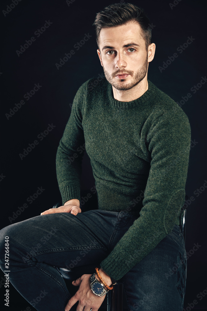 Stylish handsome man portrait on dark background Stylish handsome man portrait on dark background