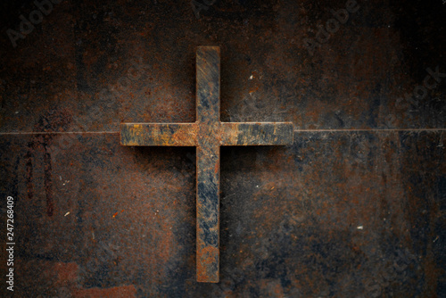 rusty cross - old and rusty cross iron door  rusty grunge background