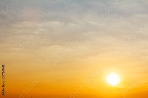 Dramatic golden sky at the sunrise background © AungMyo
