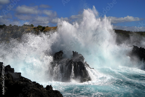 waves crashing on rocks from the ocean