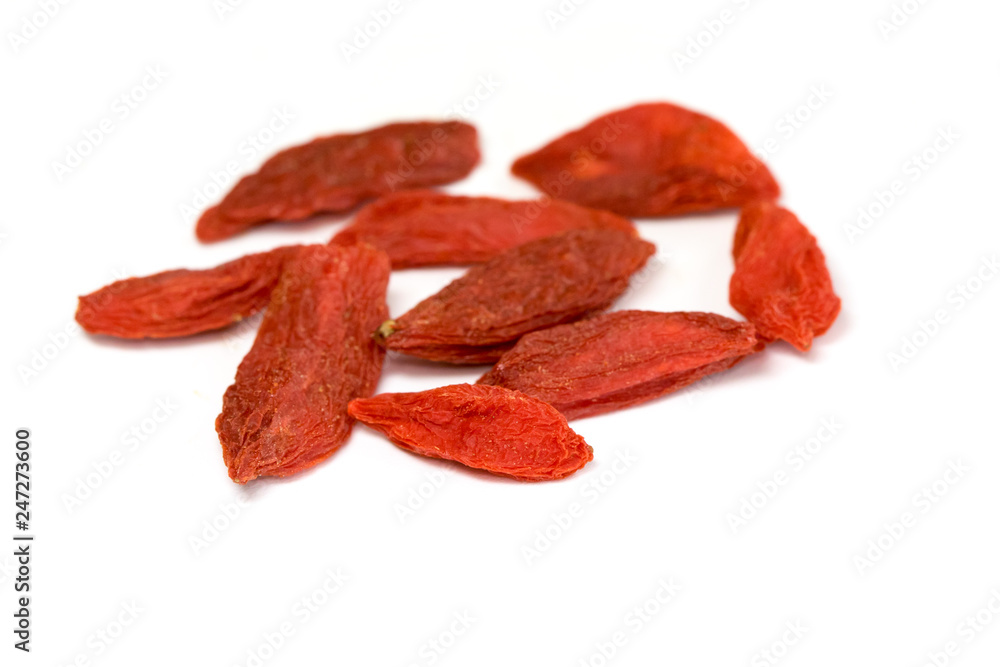 Image of dry red goji berries or chinese wolfberry on white background. Food. Image of dry red goji berries or chinese wolfberry on white background. Food.