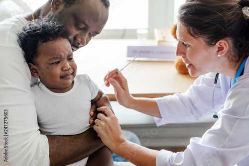 Fotografie Baby getting a first injection