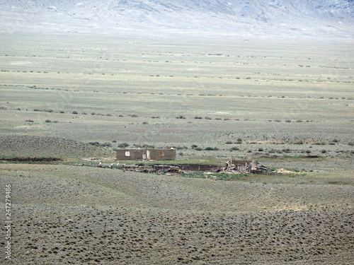 The ruins of the old settlement at the reservoir Bartogai. Kazakhstan. photo