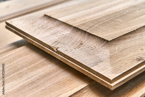 Wood door manufacturing process. Decorative door panels. Furniture manufacture.