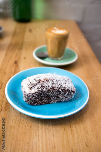 Lamingtons with a glass of coffee