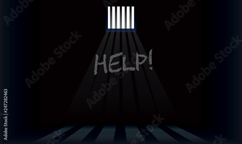 Help is written on wall of prison cell