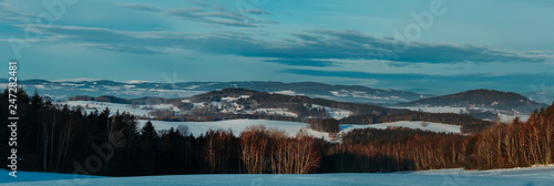 Nice panoramatic Czech winter landscape with hill and trees