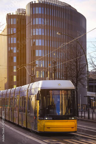 Photography Yellow  public transportation tram passing by the city of Berlin Germany