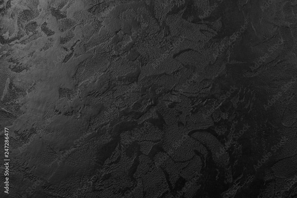 Black grunge stone texture. Dark black slate stone background. Abstract