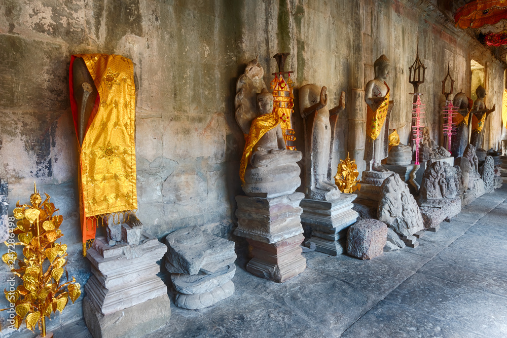 Naklejka premium Gallery of thousands Buddhas in Angkor Wat. Siem Reap. Cambodia.