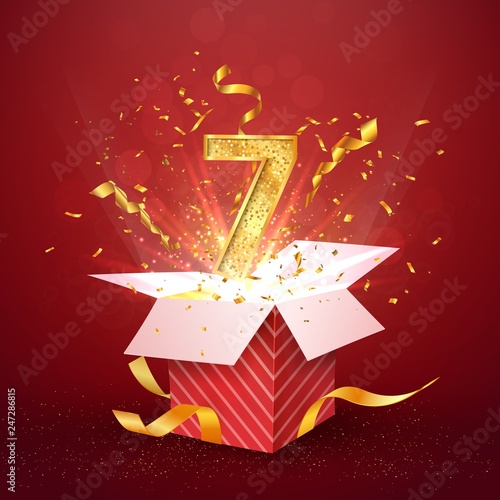 7 th year number anniversary and open gift box with explosions confetti isolated design element. Template seven seventh birthday celebration on red background vector Illustration.