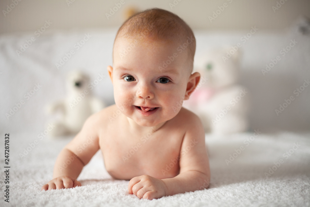 bright portrait of adorable baby - parenting or love concept. bright portrait of adorable baby - parenting or love concept.