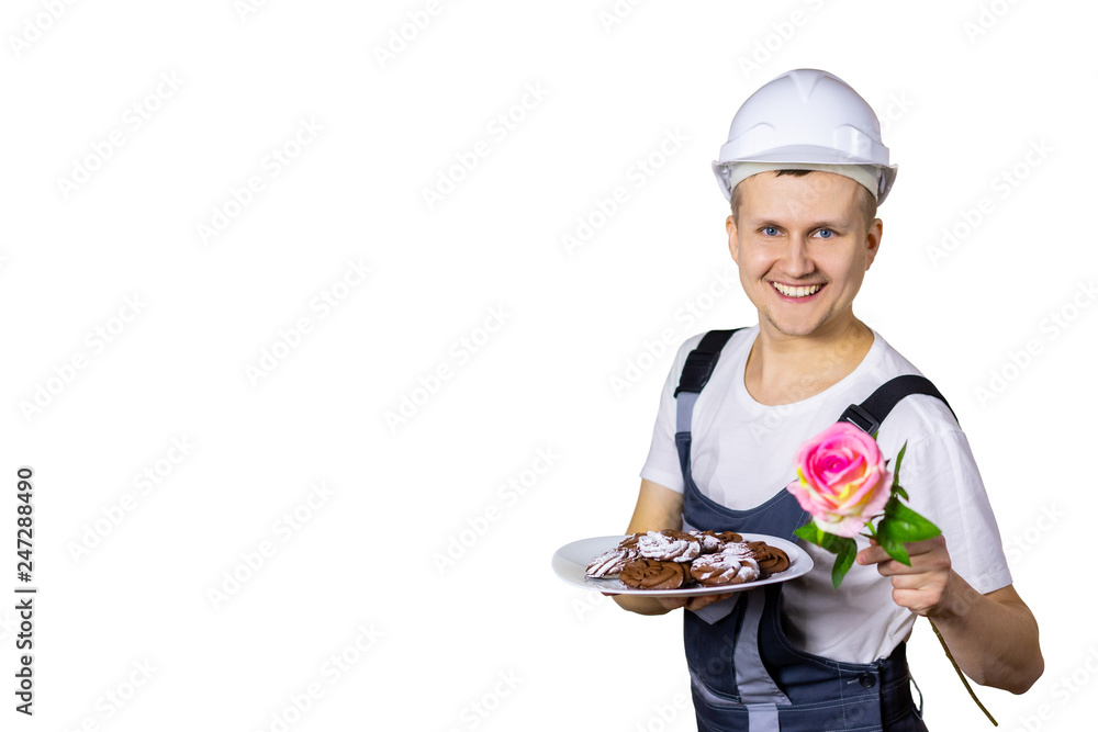 Awesome cookies surprise for you with love. Handsome young man holding roses and looking at camera with smile while standing against isolated background Awesome cookies surprise for you with love. Handsome young man holding roses and looking at camera with smile while standing against isolated background