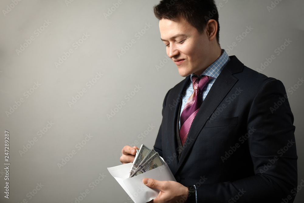 Official in business suit takes bribe, corruption. Official in business suit takes bribe, corruption.