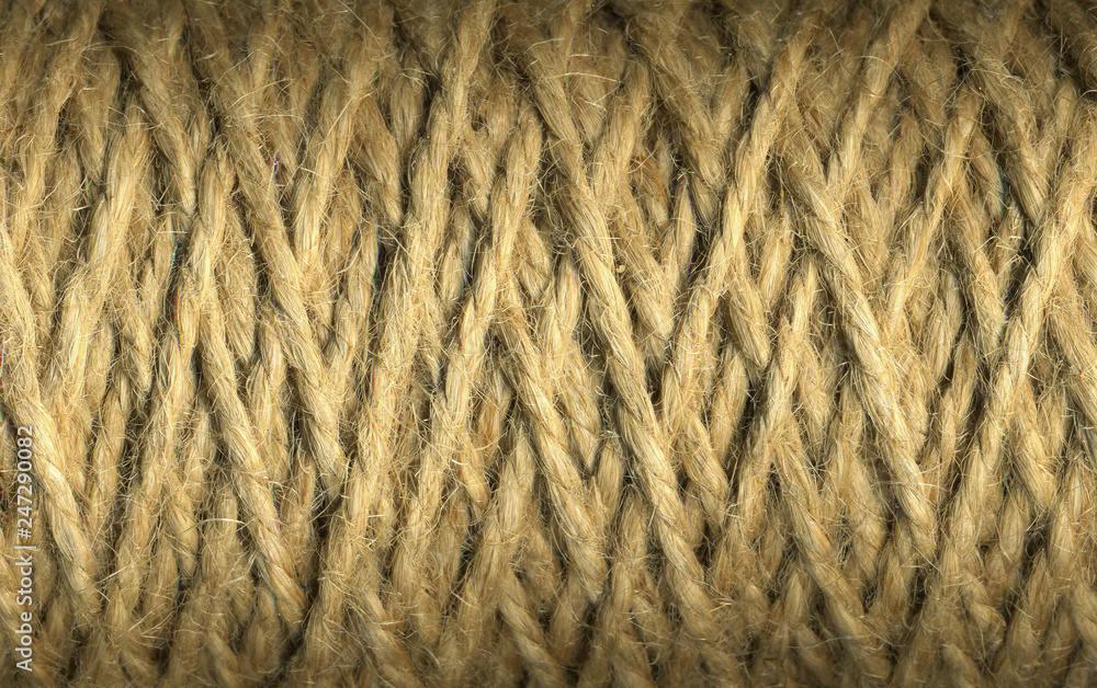 Natural jute twine roll skein of jute thread texture. micro shot