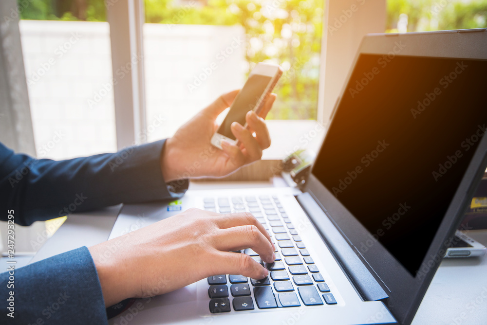 Business woman using smart phone in work at office Business woman using smart phone in work at office