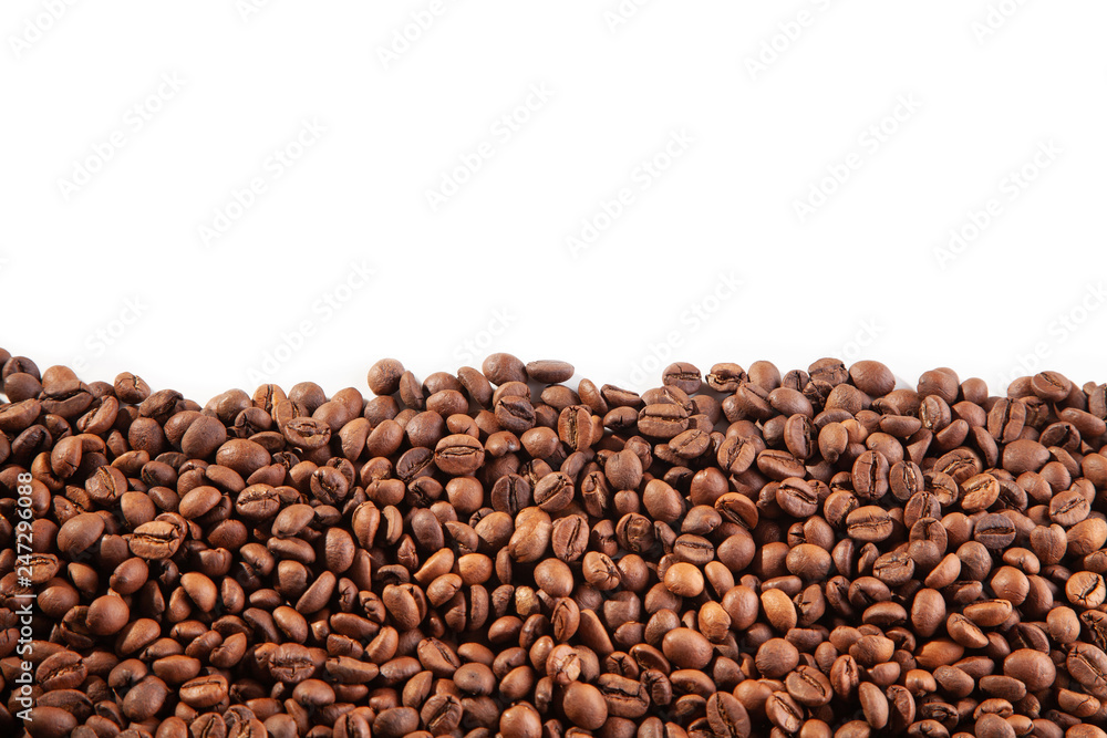 Textured brown coffee beans on a white background. Textured brown coffee beans on a white background.