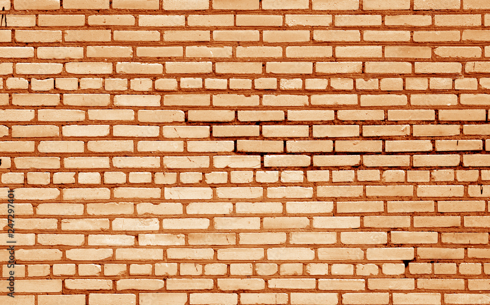 Old brick wall surface in orange tone. Old brick wall surface in orange tone.