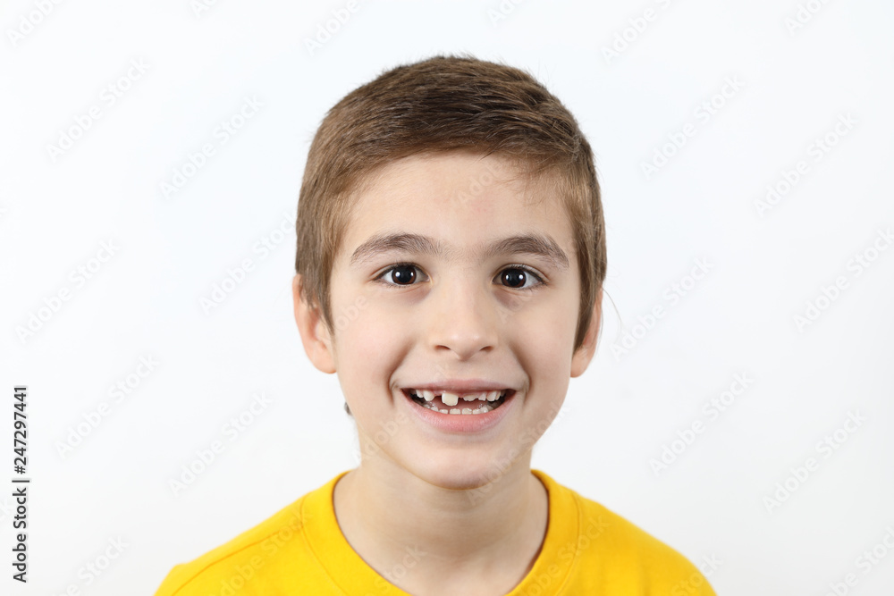 Cute Little Boy Wide Smiling Looking At Camera On White Background Close Up Cute Little Boy Wide Smiling Looking At Camera On White Background Close Up