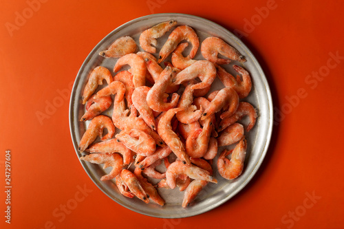 raw shrimp on a metal tray