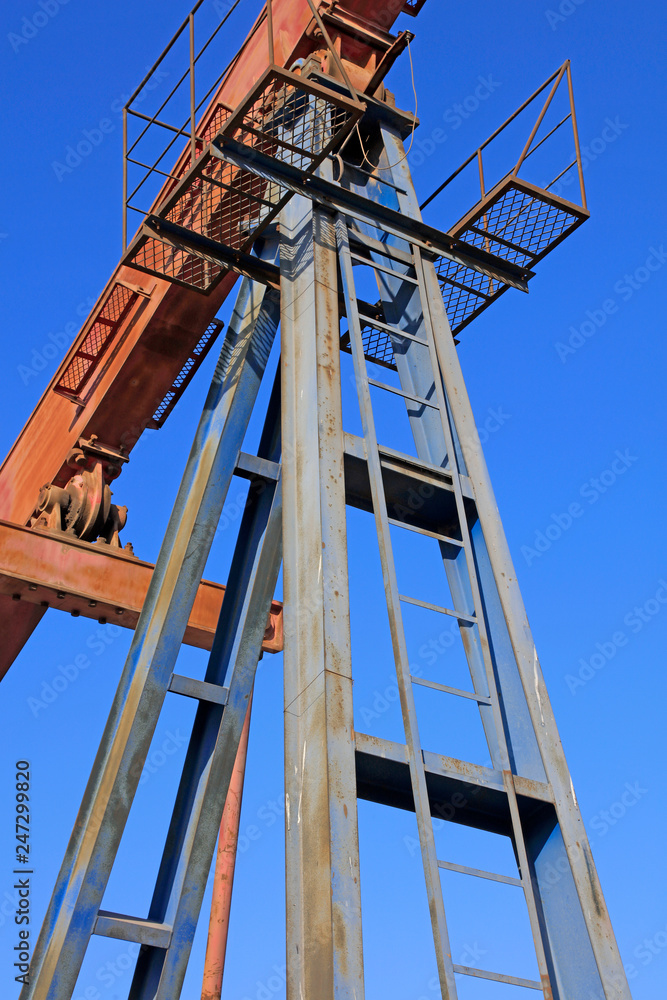 Pumping unit metal framework under blue sky