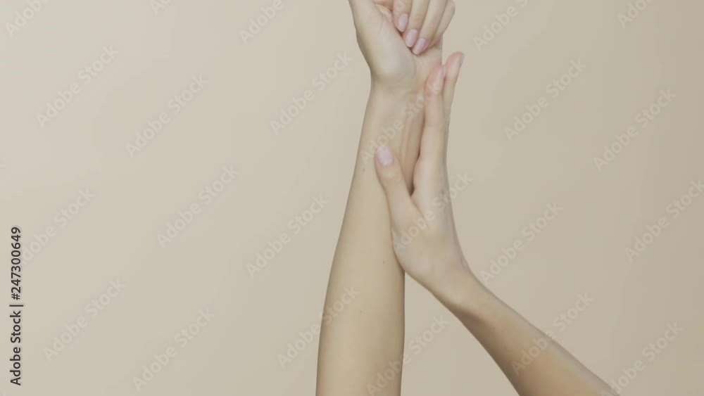 Feminine hands on a beige background, recorded on Red Monstro using the Briese Focus 140 HMI light. Feminine hands on a beige background, recorded on Red Monstro using the Briese Focus 140 HMI light.