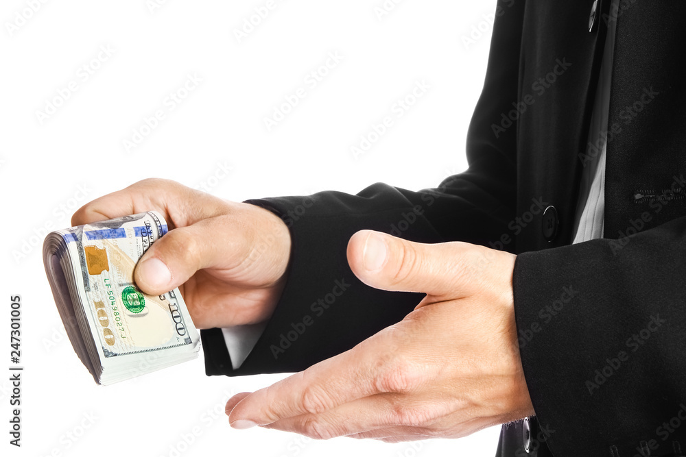 Business man holding money on white background Business man holding money on white background