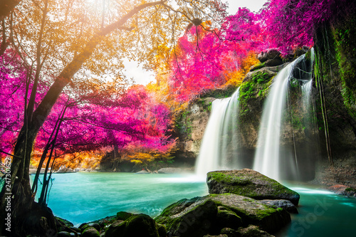 Amazing in nature, beautiful waterfall at colorful autumn forest in fall season © totojang1977