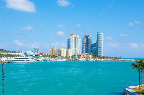 Miami, Florida, USA downtown skyline. Building, ocean beach and blue sky. Beautiful city of United States of America