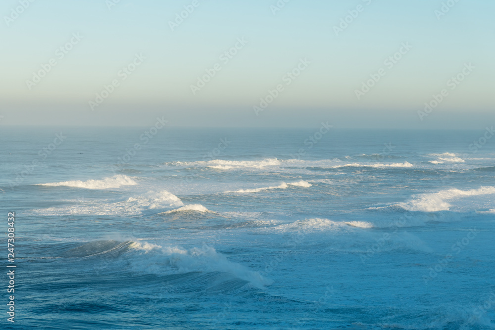 Atlantic ocean in morning at Nazare, Portugal.