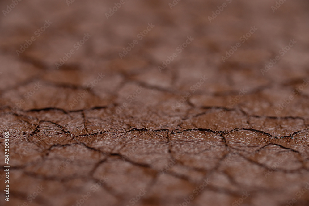 Fototapeta premium Cracked brown paint on the metal, backgrounds. Abstract background, empty template.