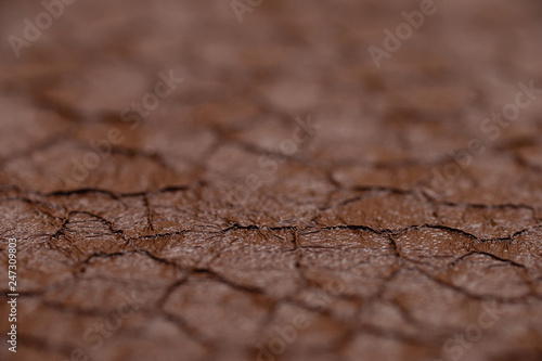 Cracked brown paint on the metal, backgrounds. Abstract background, empty template.
