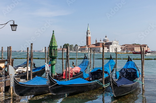 gondola at the pier in Venice © dieterjaeschkephotos