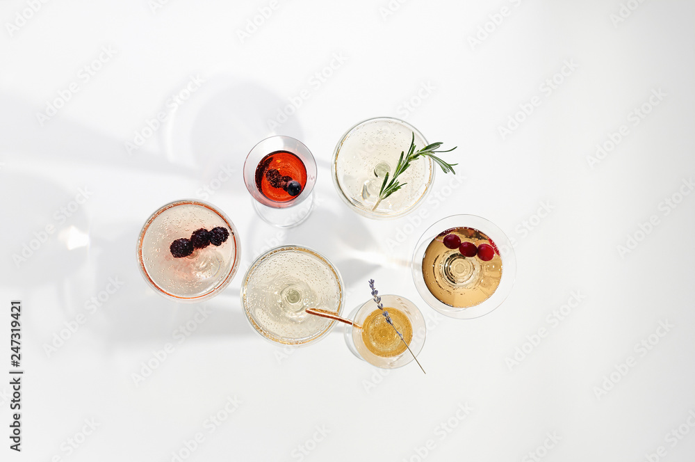 Six easy Champagne cocktails on white background