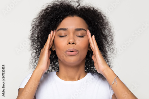 Fotografia, Obraz Nervous african woman breathing calming down relieving headache or managing stre