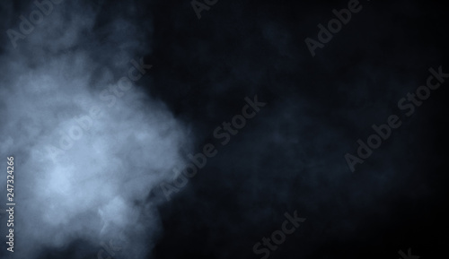 Abstract blue smoke misty fog on isolated black background. Texture overlays. Design element.
