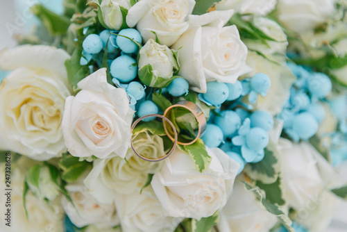 Bouquet of flowers. The bride s bouquet. Bridal bouquet. Floristics. Wedding rings.