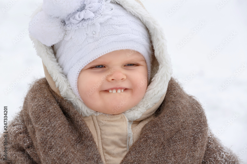 Portrait of a little girl of nursery age in winter Portrait of a little girl of nursery age in winter