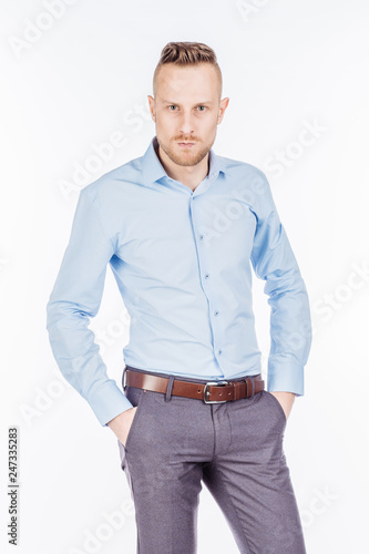 Man on a white studio background. emotions and people concept.